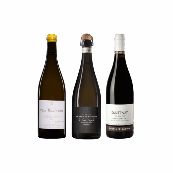 Photo d’un coffret de trois vins français : Vouvray Les Murs de Clos, Champagne Le Chemin Empreinté et Santenay 1er Cru Clos Rousseau, présenté pour offrir ou déguster.